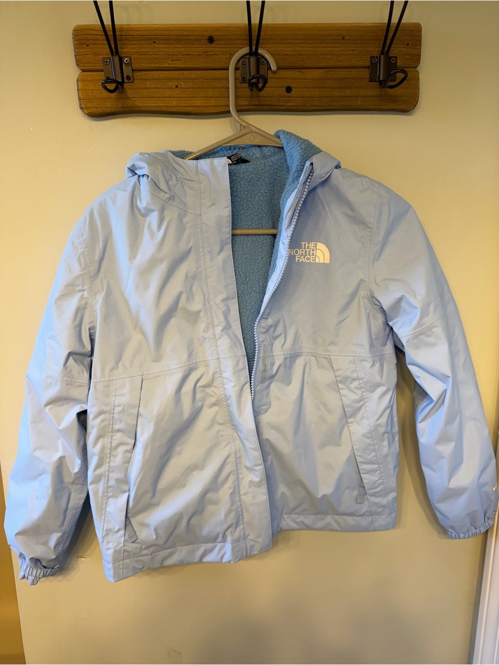 The North Face Light Blue Hooded Kids Raincoat with Fleece Lining